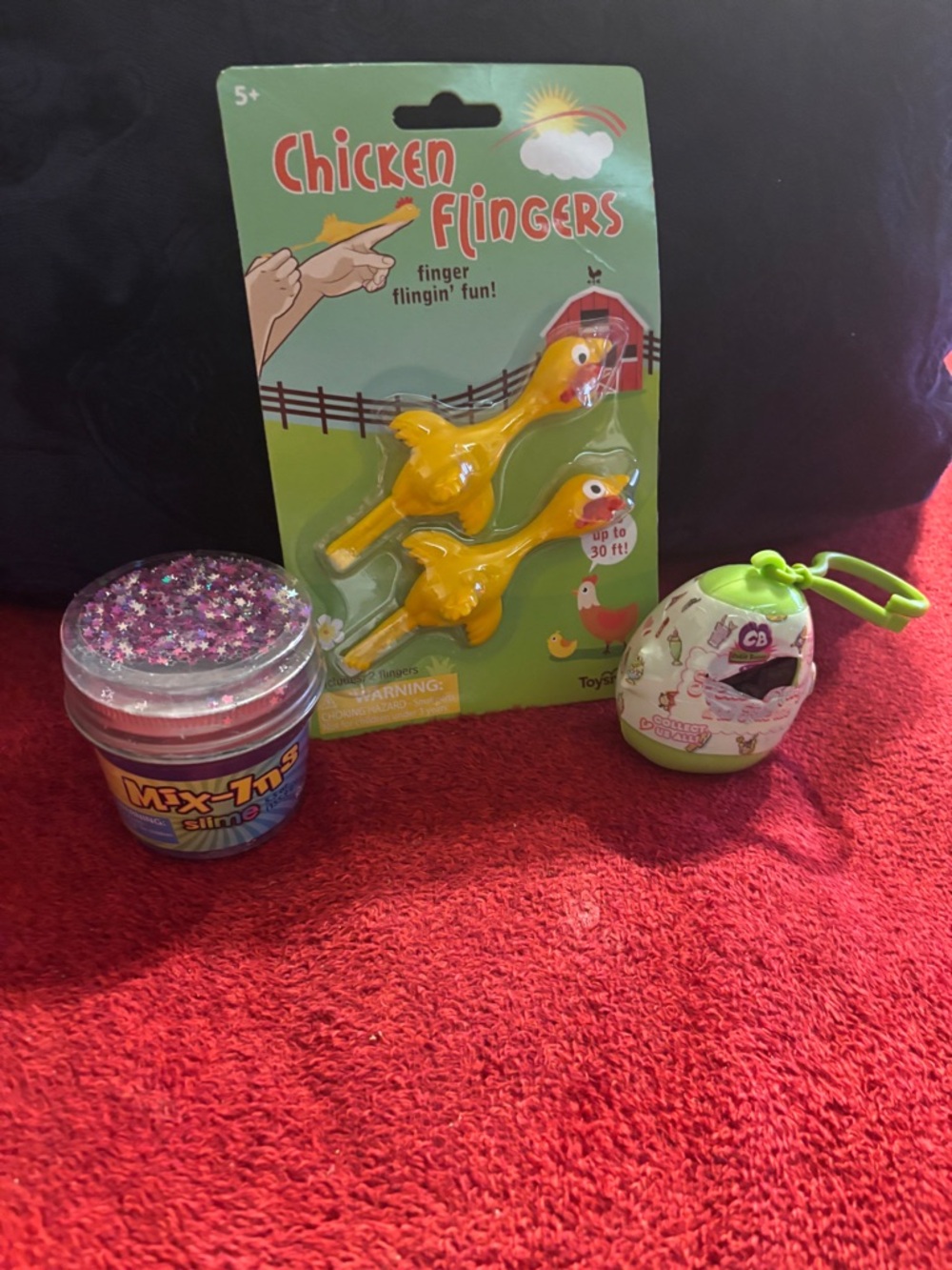 Chicken Flingers Finger Launcher , Mix ins slime & Cutie Beans Key chain . New